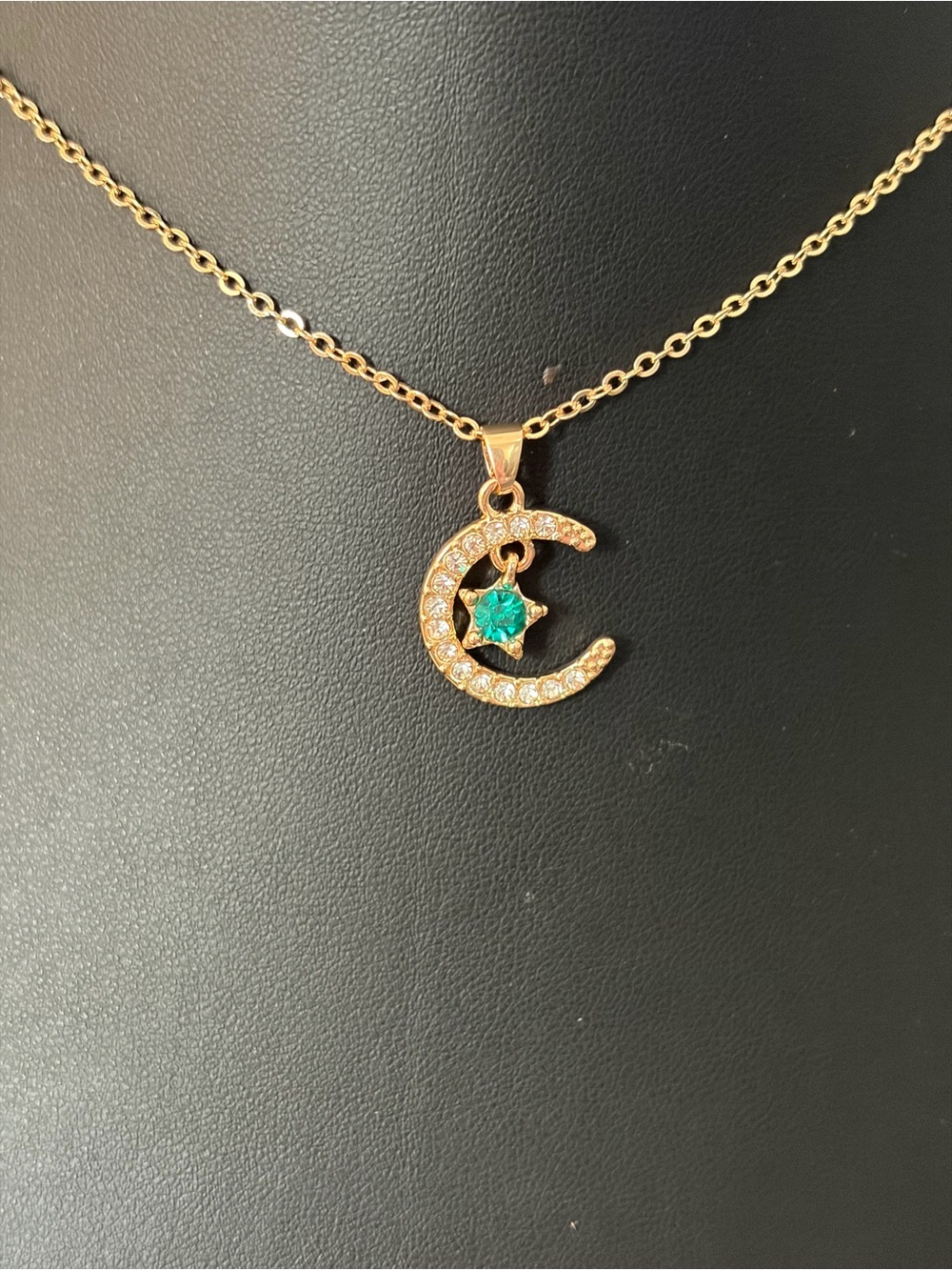 Gold Crescent Moon Necklace with Green Star Accent